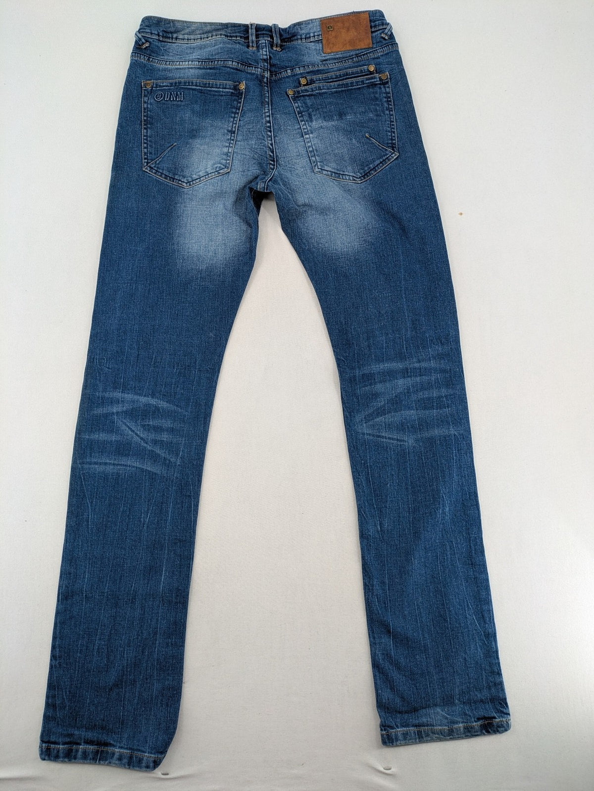 Tom Tompson blue straight jeans with classic 5-pocket style and subtle used effects.