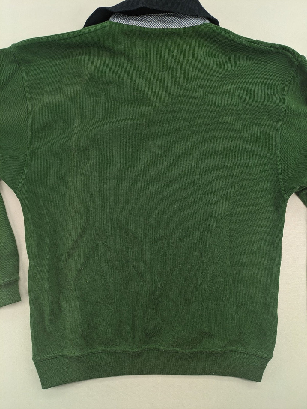 Headlands green turtle neck jumper with gingham collar and "Golden Beach" embroidery.
