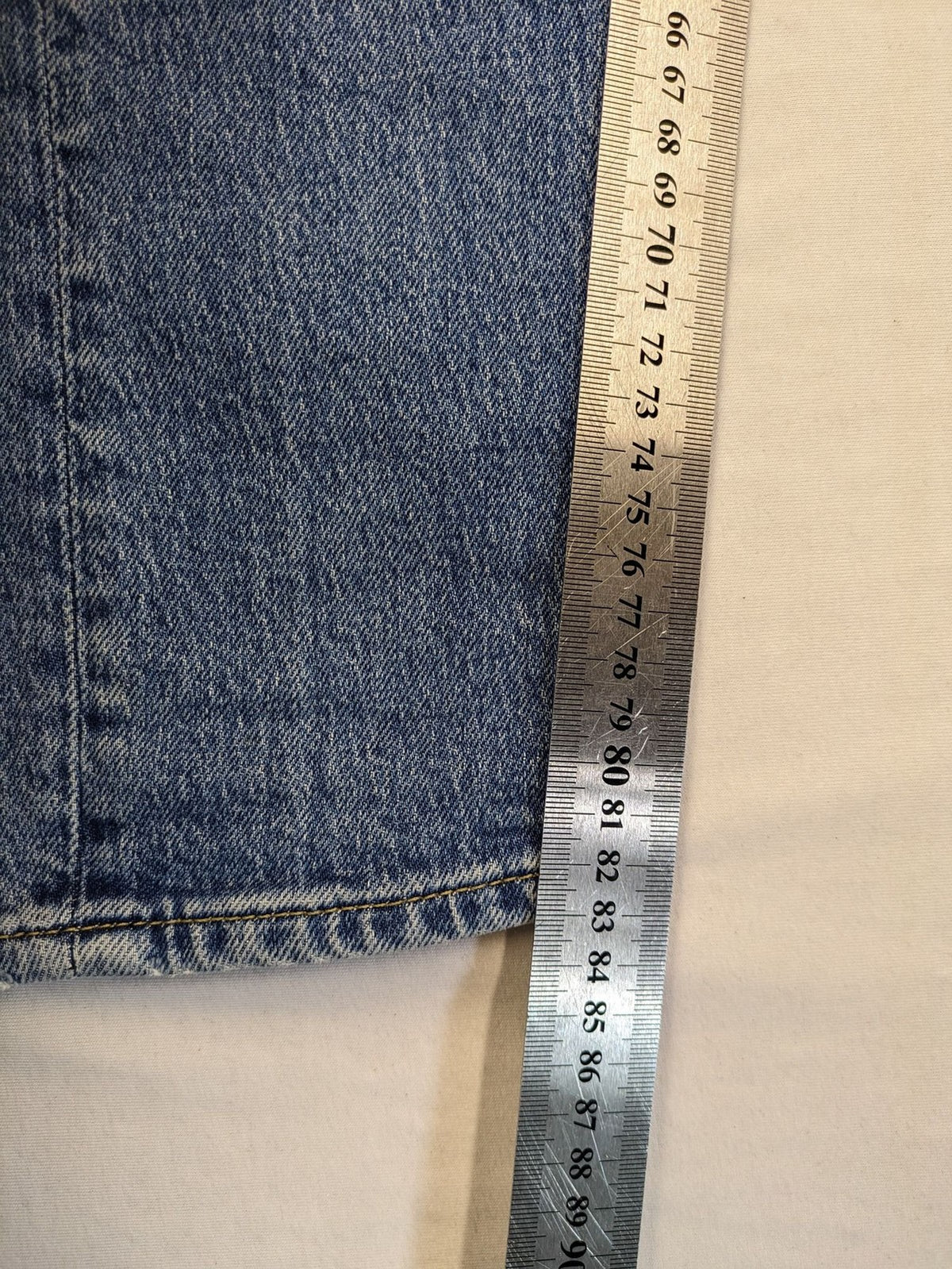 CHASIN' blue slim fit jeans with button fly and classic denim craftsmanship.