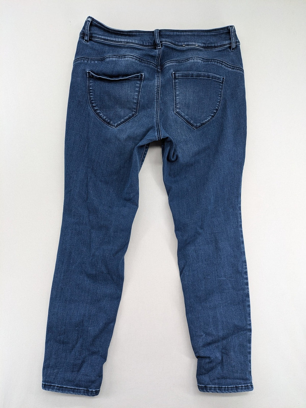 Tom Tailor blue skinny jeans with classic 5-pocket design and double button closure.