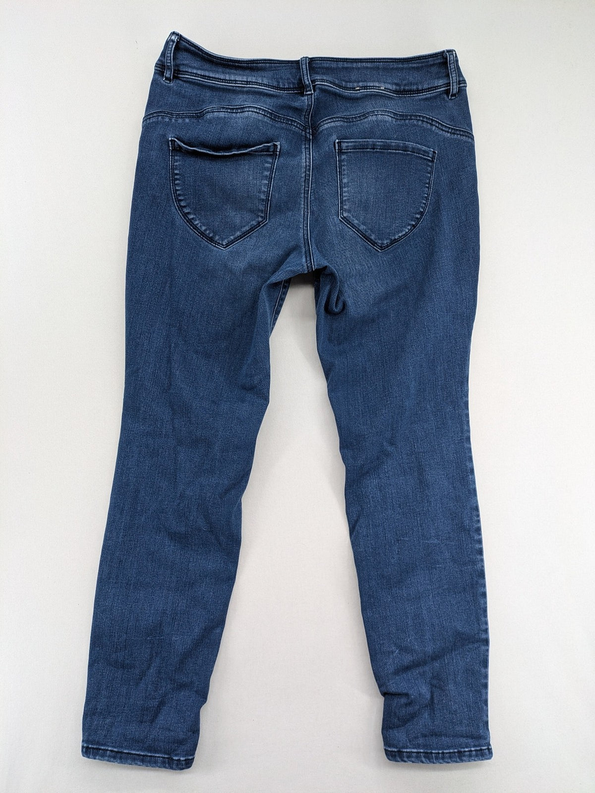 Tom Tailor blue skinny jeans with classic 5-pocket design and double button closure.