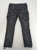 Indicode grey cargo pants with multiple pockets and durable cotton material.