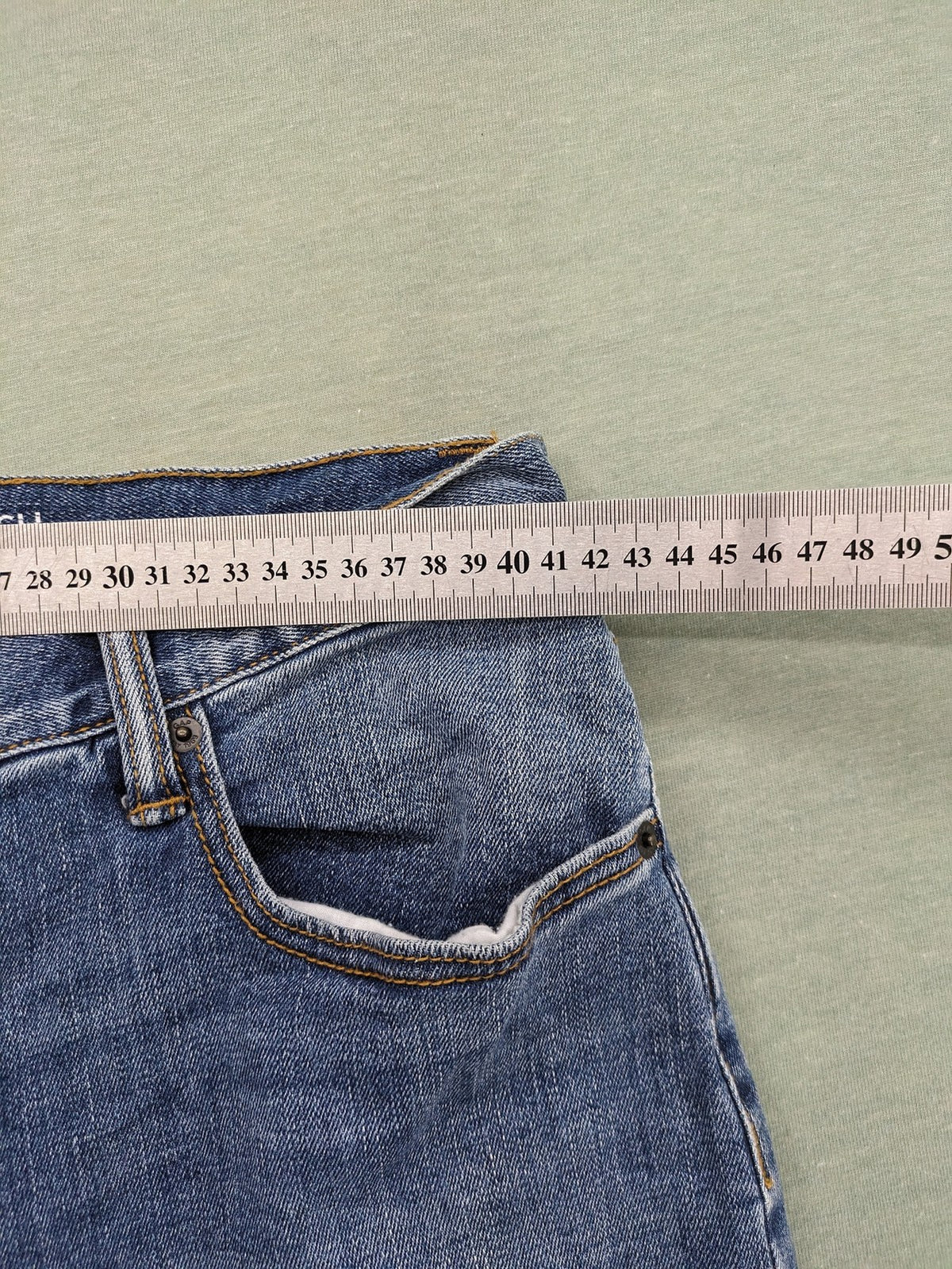 Gap blue straight jeans slim stretch fit with classic denim wash and logo tag.