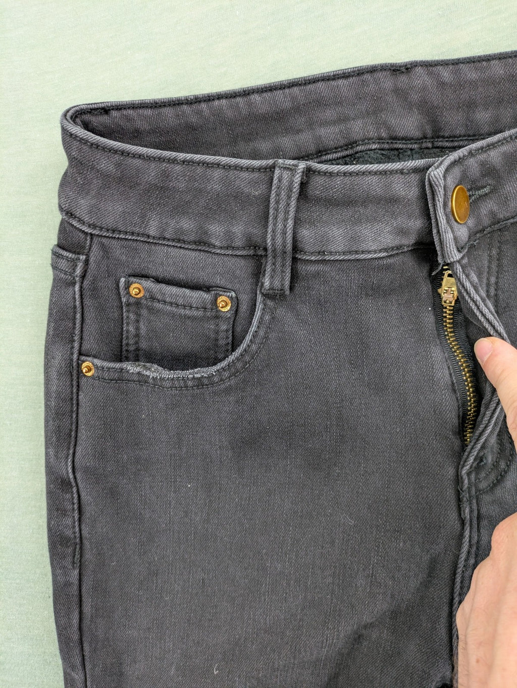 Disney black straight jeans with Minnie Mouse detail, cropped length, stretchy cotton blend.
