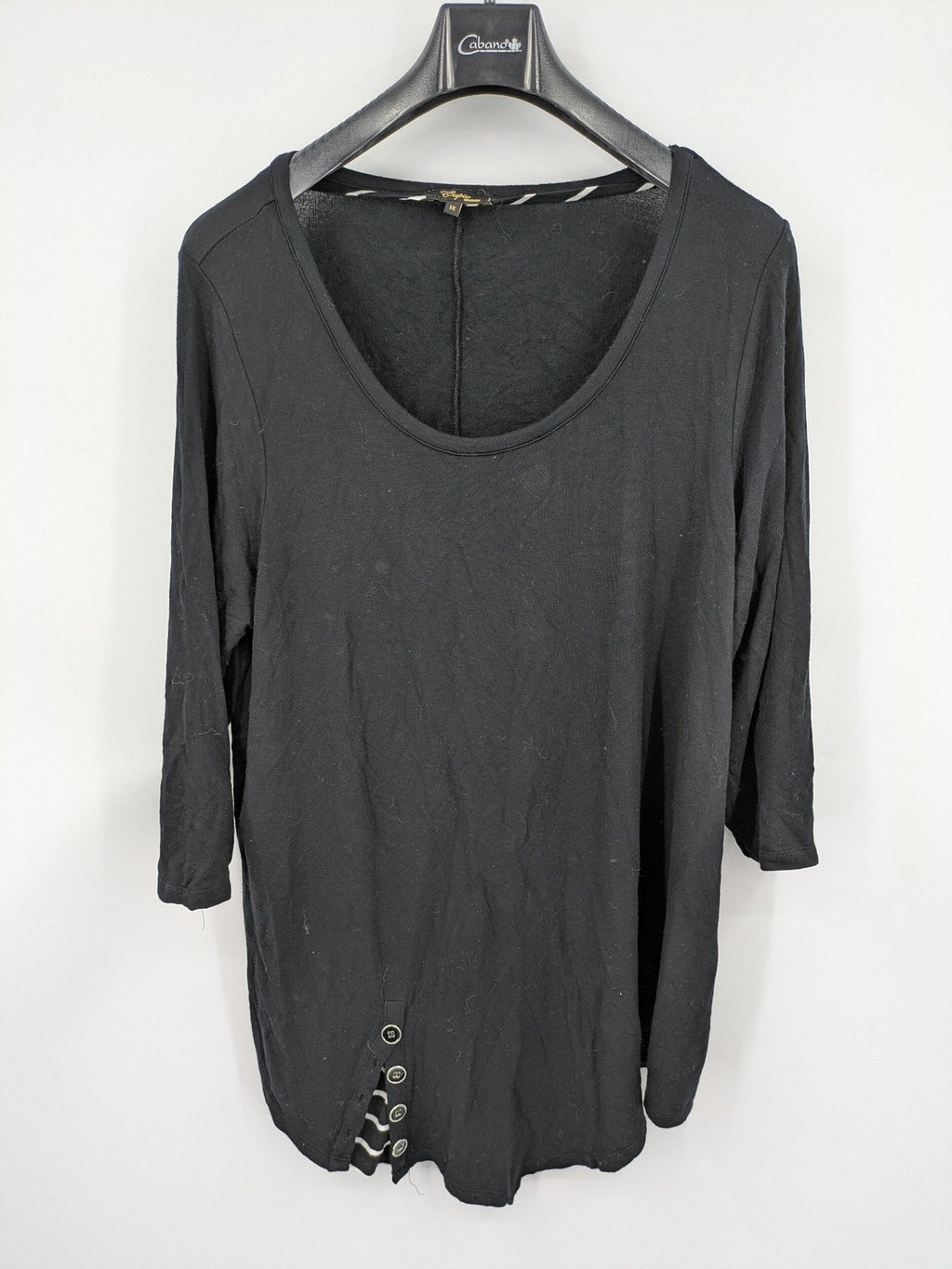 Cupio black long sleeve tunic with side button placket and high-low hem.