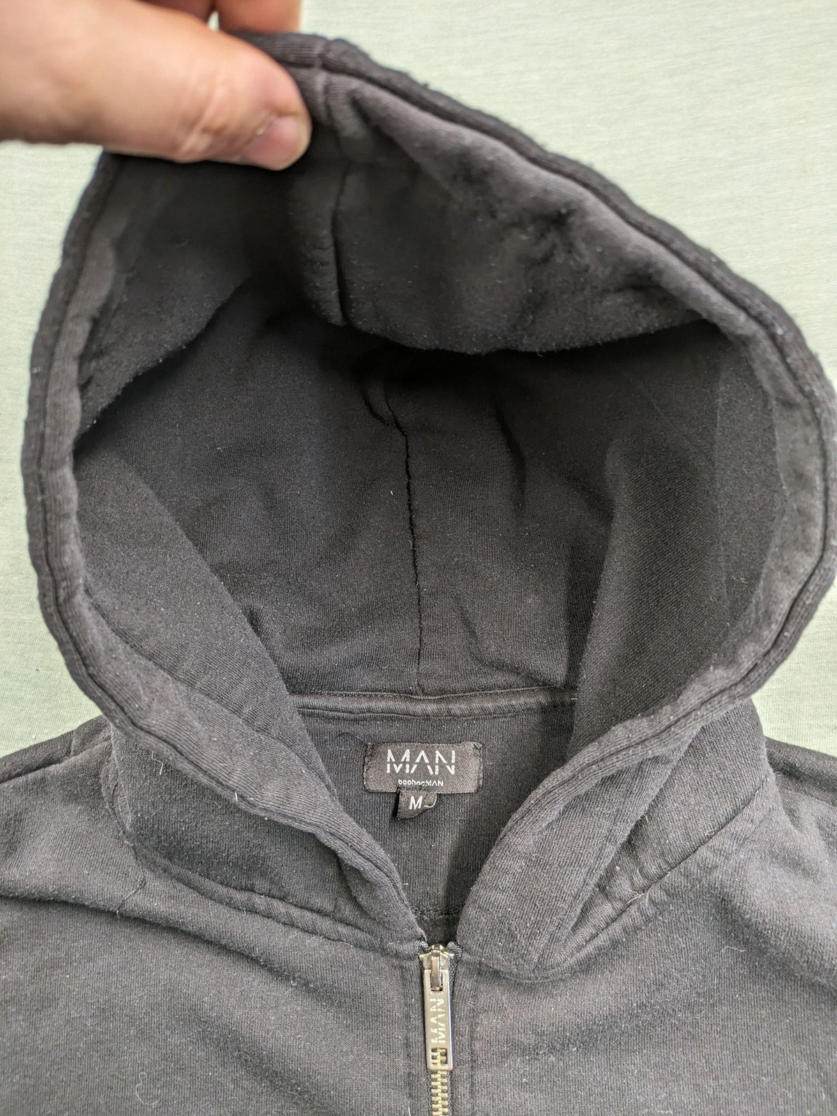 Boohooman zip-through hoodie black with floral graphic and "Limited Edition Collection" text.
