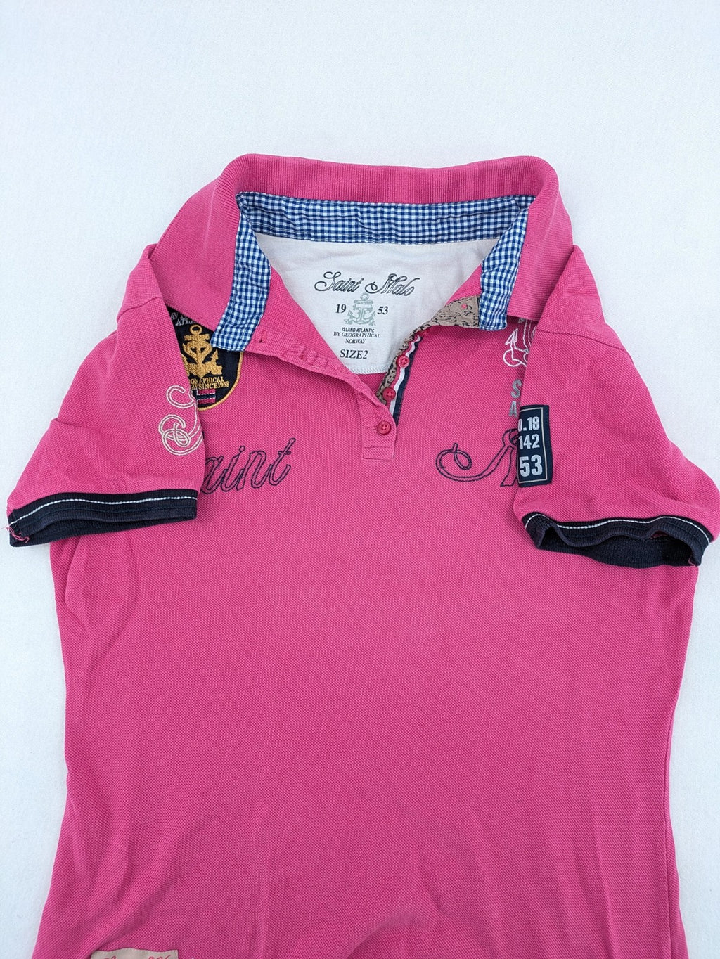 Geographical Norway pink polo shirt with embroidered Saint Malo design and Gingham trim.