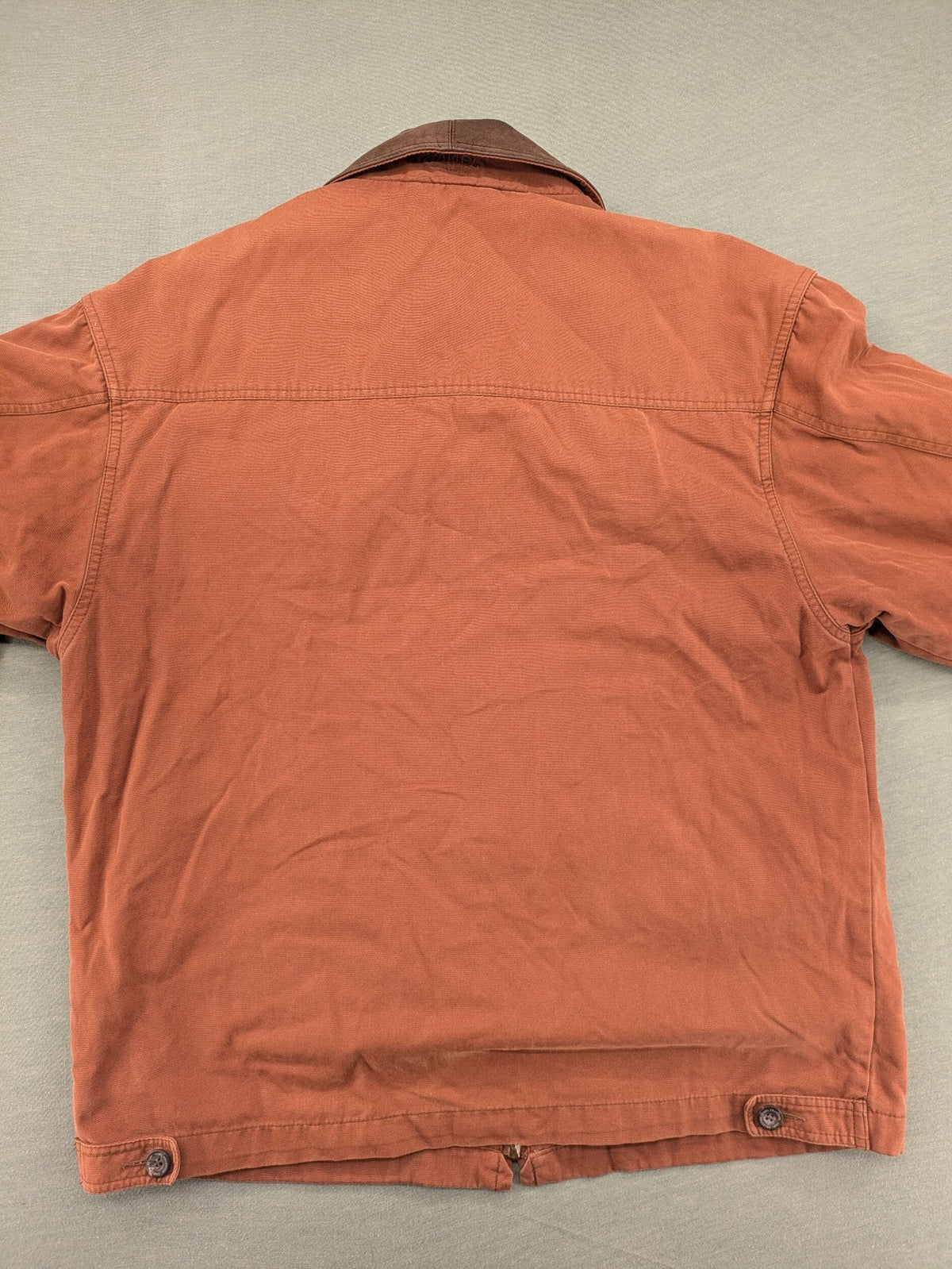 Camel Collection brown jacket with orange contrast collar and embroidered logo.