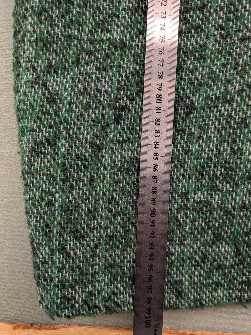 Esprit green black white tweed coat with notch collar and three-button closure.