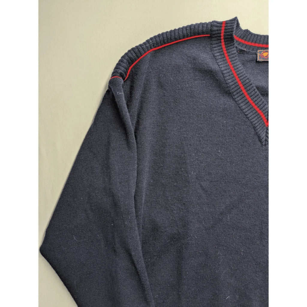 Il Granchio grey turtle neck jumper with red accents and embroidered crab logo.