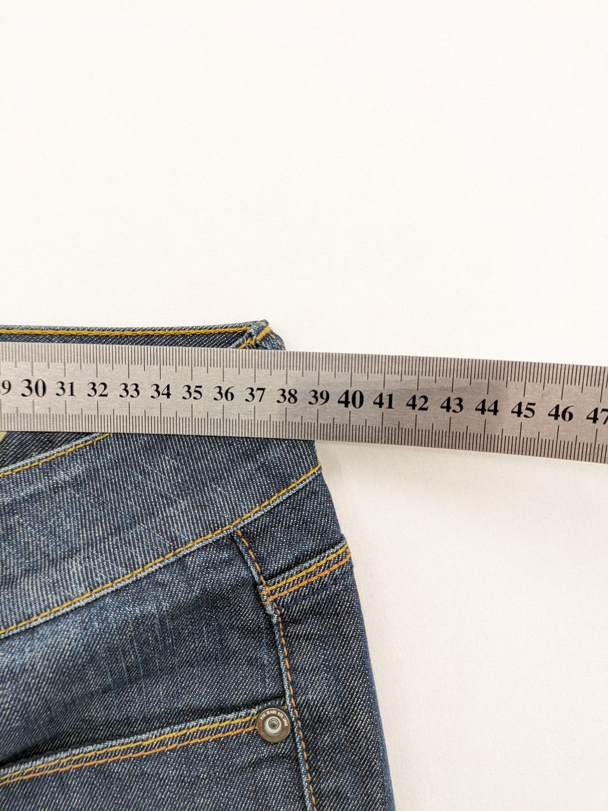 Exe blue straight jeans slim fit bootcut stretch denim with classic 5-pocket styling.