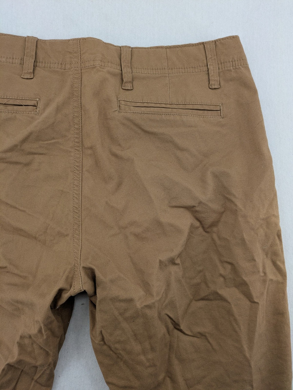 Nautical tan chino pants straight fit cotton blend with subtle anchor print lining.