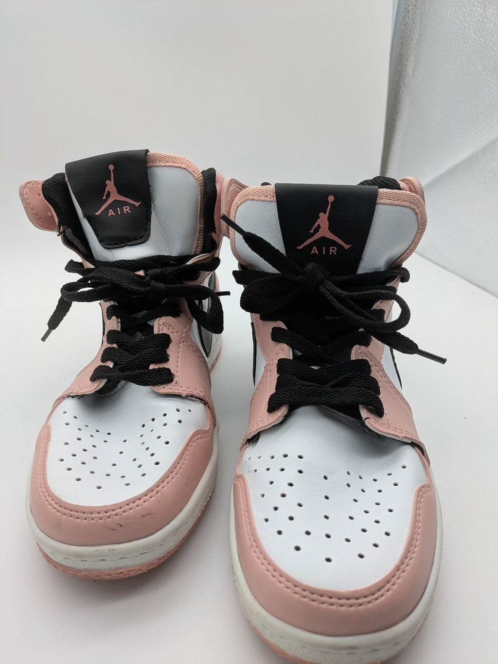 Nike Air Jordan high-top sneakers multi with Wings logo, Jumpman detail, and perforated toe.