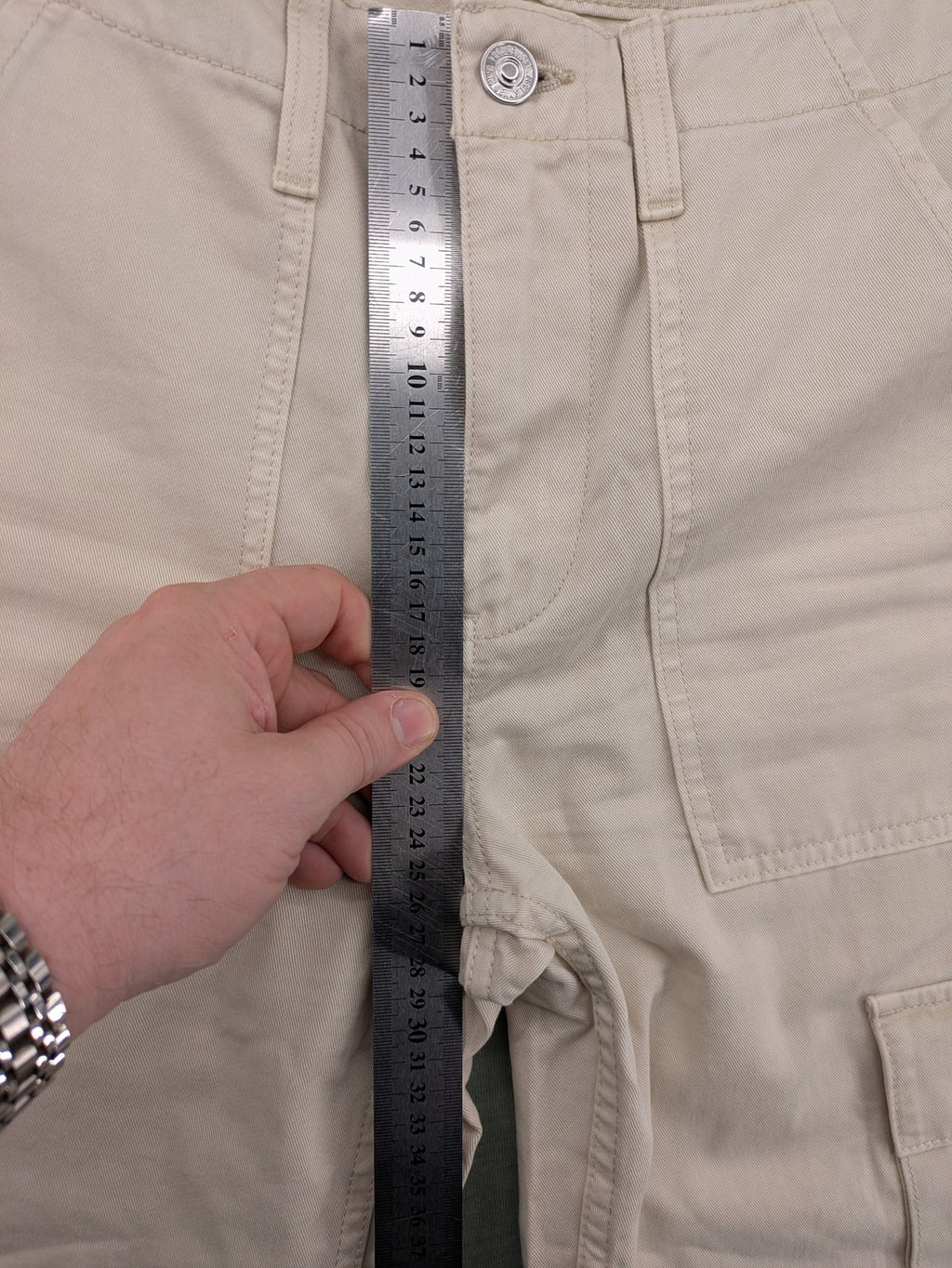 MNG beige cargo pants with straight leg, button closure, and patch pockets.