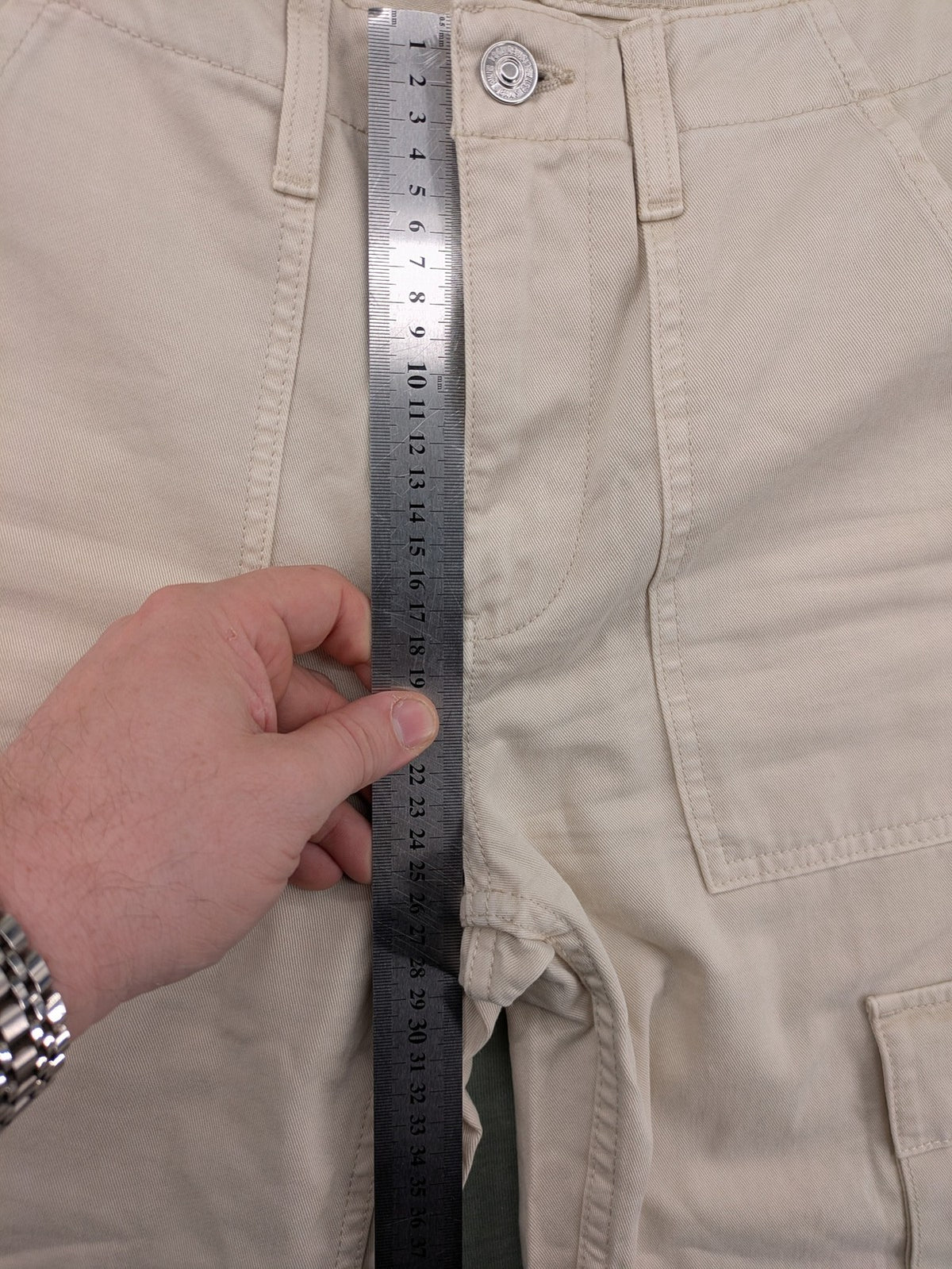 MNG beige cargo pants with straight leg, button closure, and patch pockets.