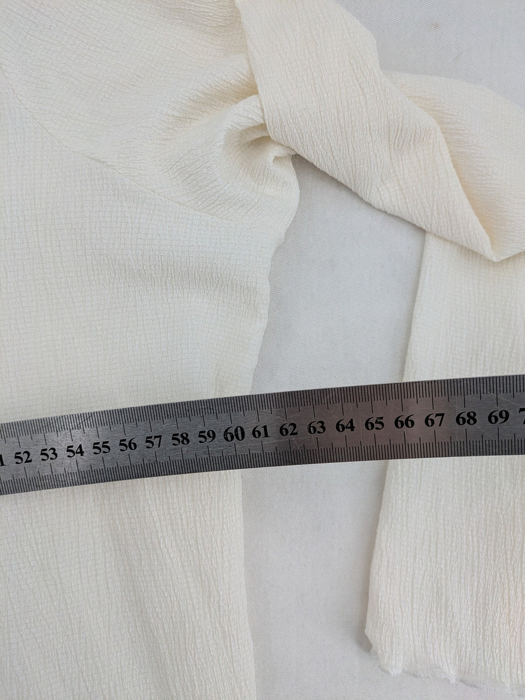 C&A cream blouse XXL textured crinkle fabric with gold button placket and wavy hem.