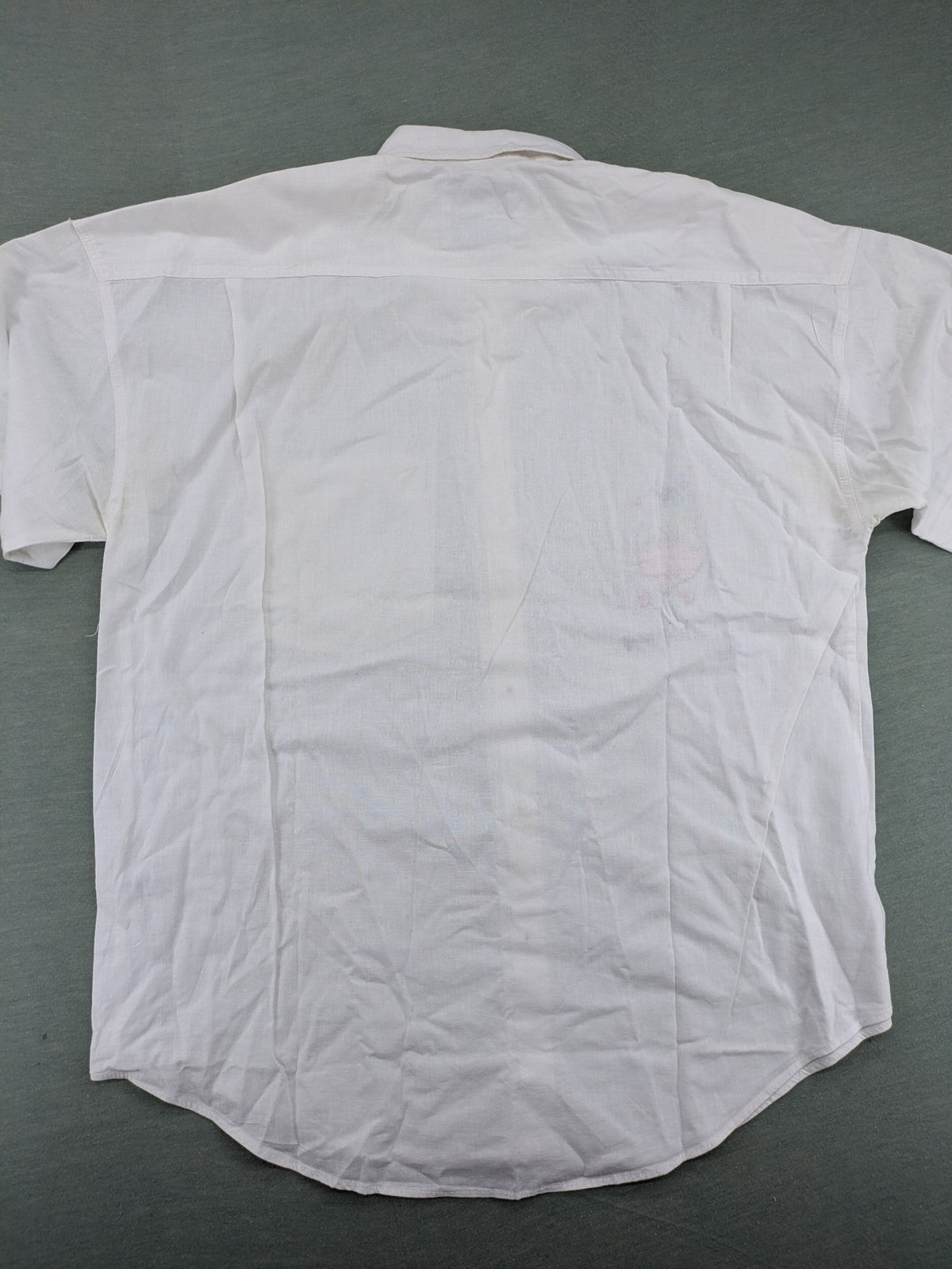 Southwest Castle vintage short-sleeve shirt white with colorful cartoon embroidery and German text.