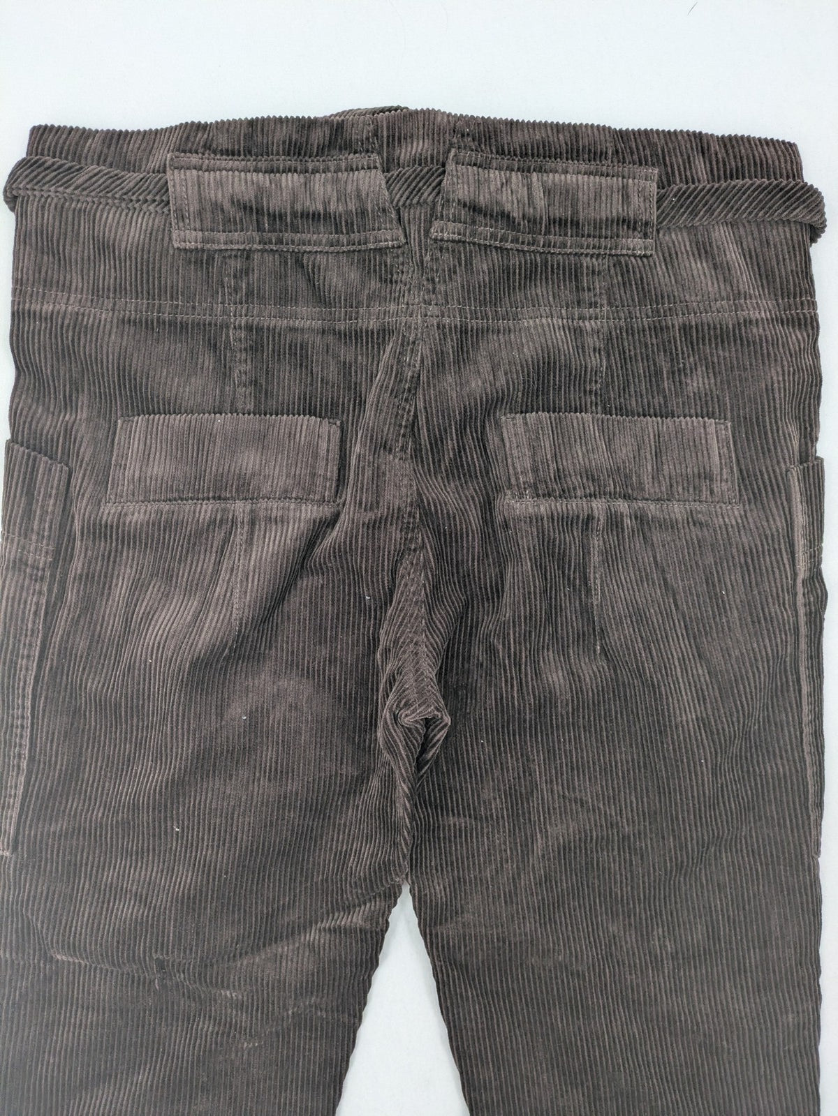 Alma & Lovis brown cord pants paperbag style with belt, made from organic cotton.