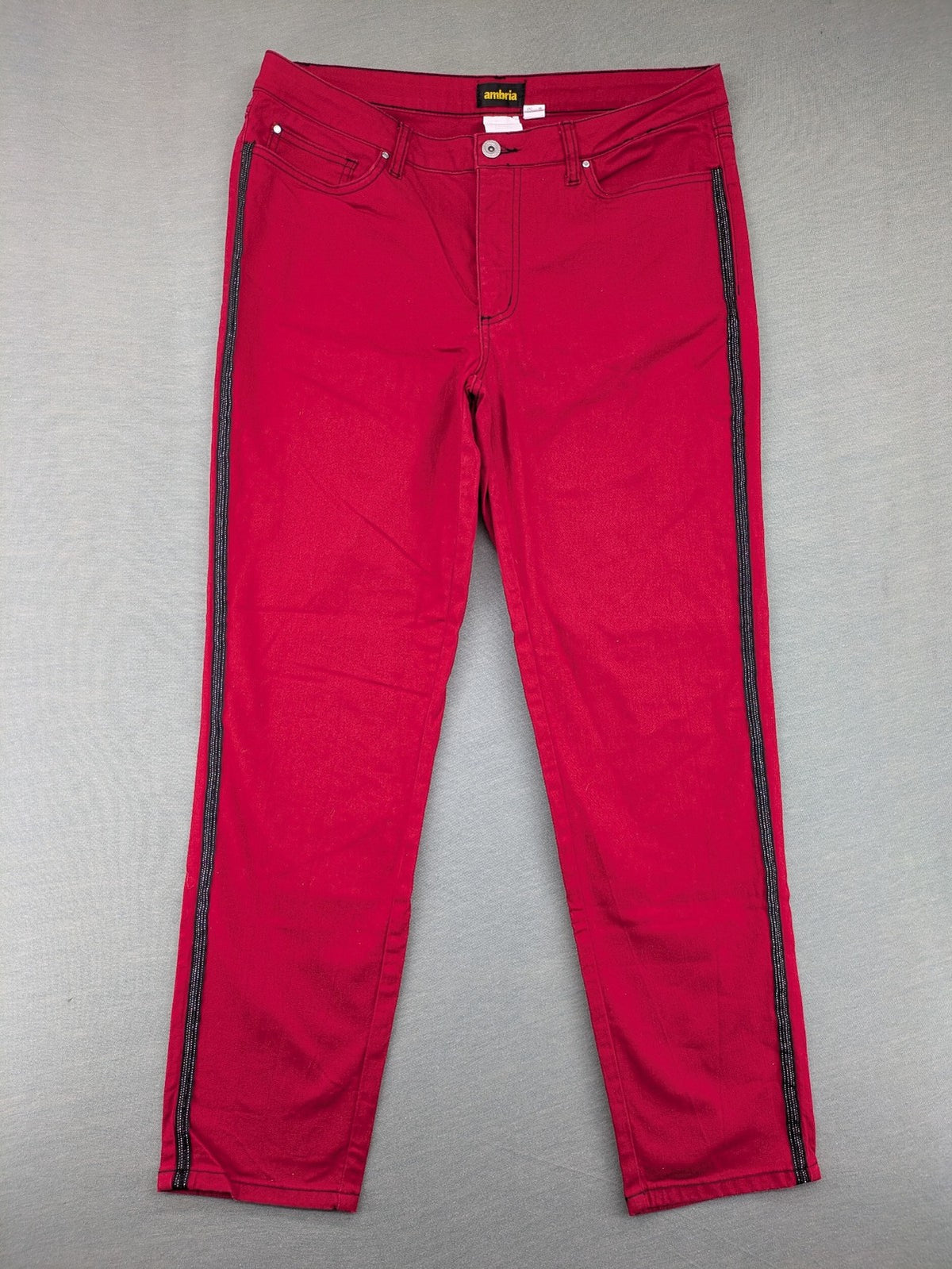 Ambria red straight jeans with black side stripe, classic five-pocket design, stretch cotton blend.