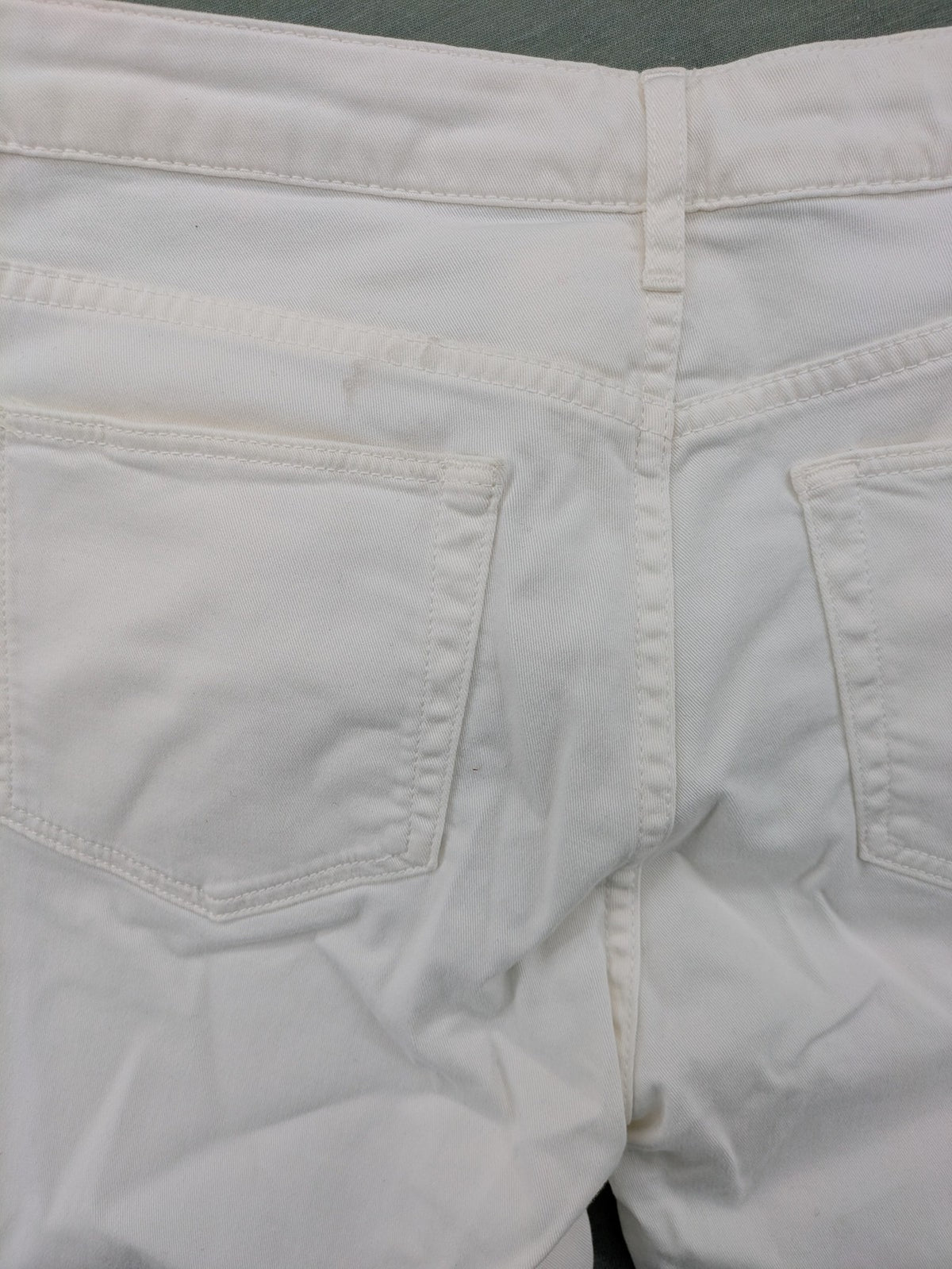 Lacoste white straight jeans high rise slim fit with logo and stretch denim material.
