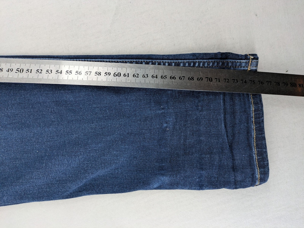 Replay slim fit jeans blue with subtle fading and stretch denim material.