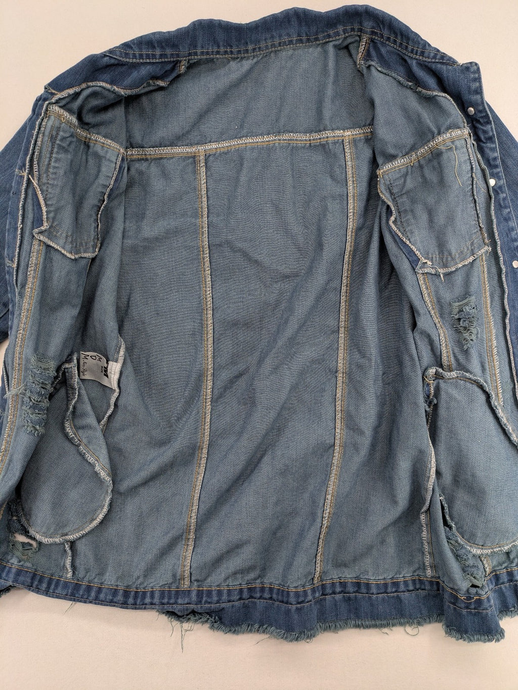 perfekt blue denim jacket distressed look frayed hem button closure and pockets