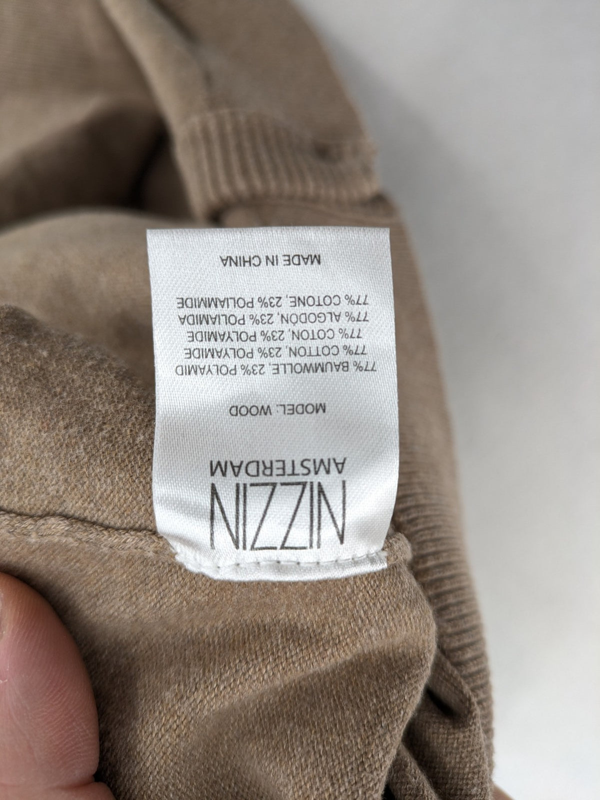 Nizzin Amsterdam knit jumper beige V-neck with button placket and soft cotton blend.