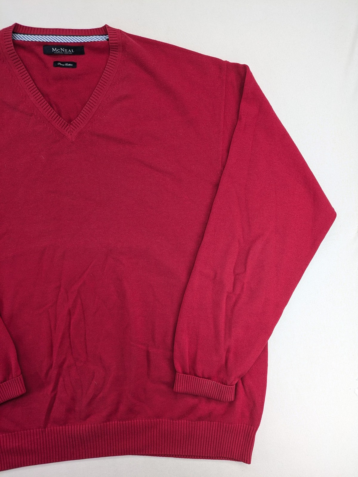 McNeal red turtle neck jumper V-neck design with ribbed cuffs and hem.