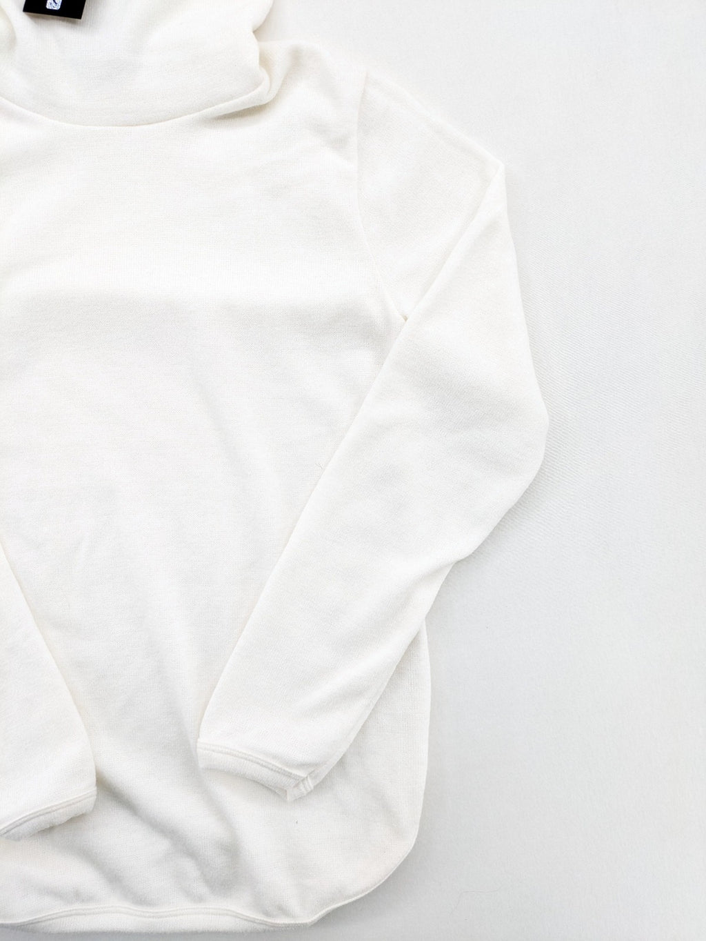 Monica Braghini white turtle neck jumper soft fabric classic design with high collar.
