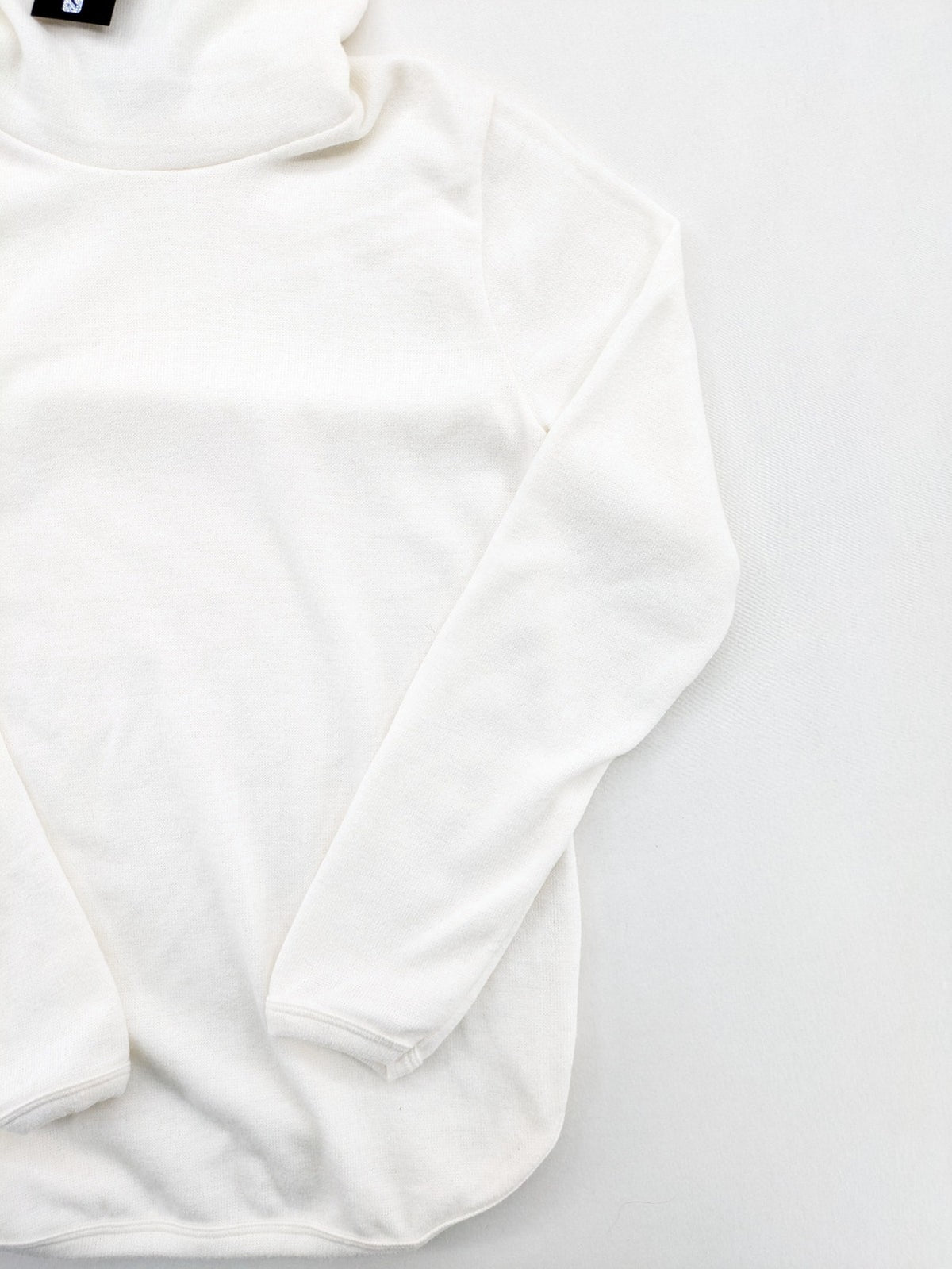 Monica Braghini white turtle neck jumper soft fabric classic design with high collar.