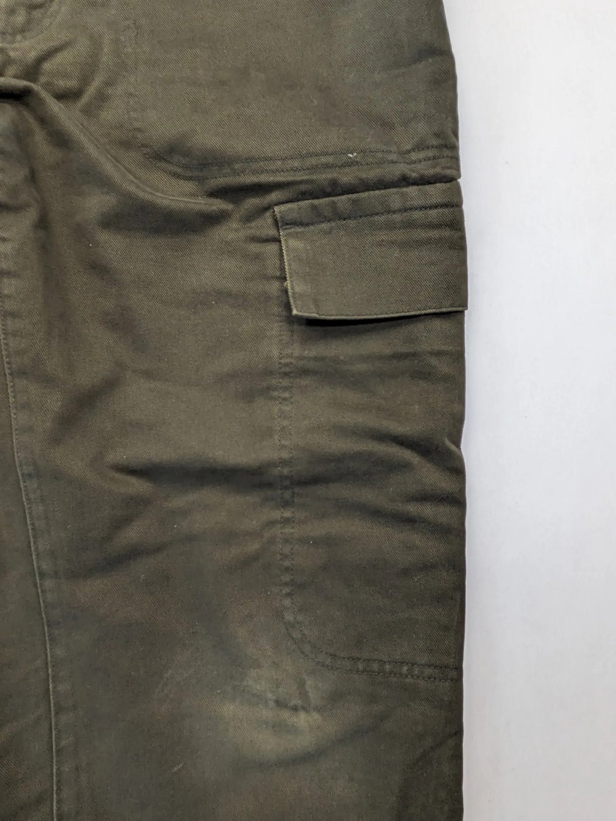 Lands' End green cargo pants with plaid flannel lining and traditional fit design.