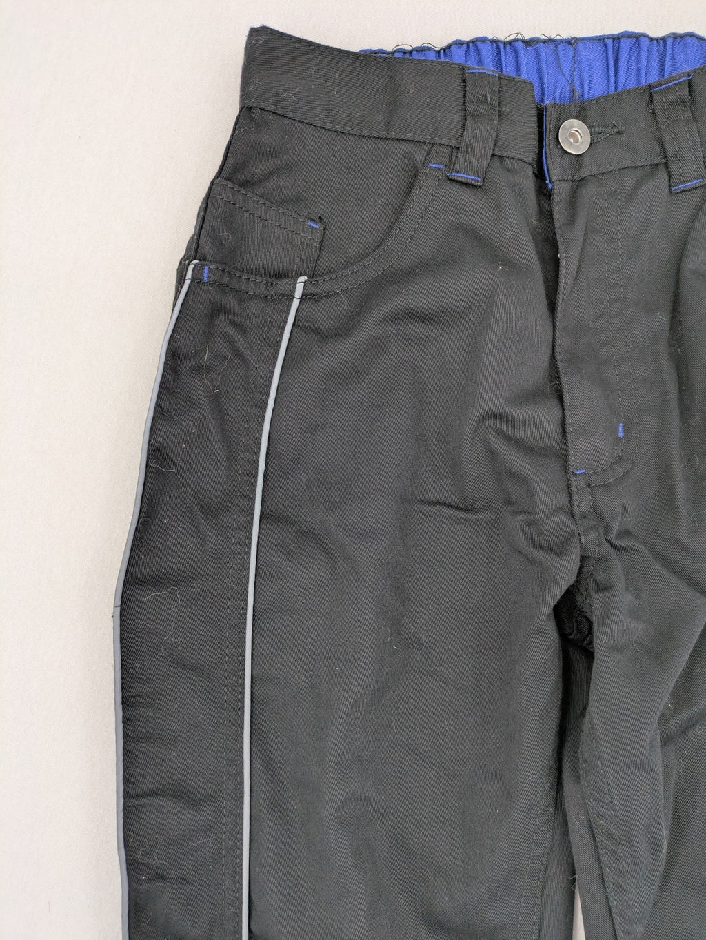 Powerfix Profi blue cargo pants with reflective stripes and side pockets, durable polyester-cotton blend.