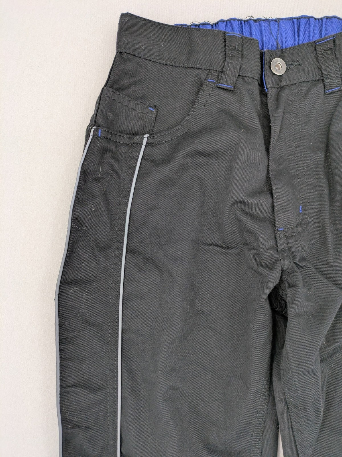 Powerfix Profi blue cargo pants with reflective stripes and side pockets, durable polyester-cotton blend.