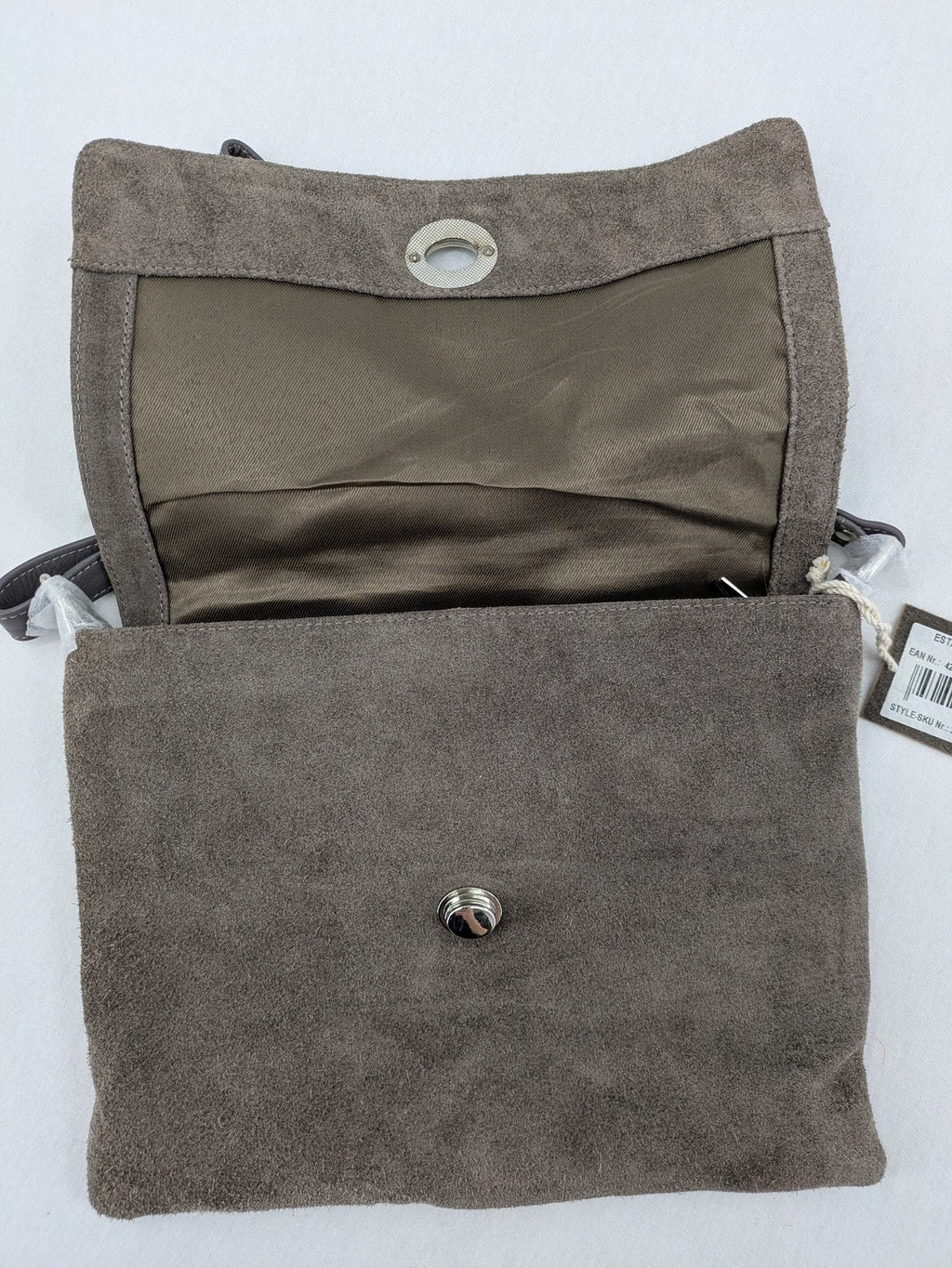 CNTMP grey suede crossbody handbag with flap and silver twist lock closure.