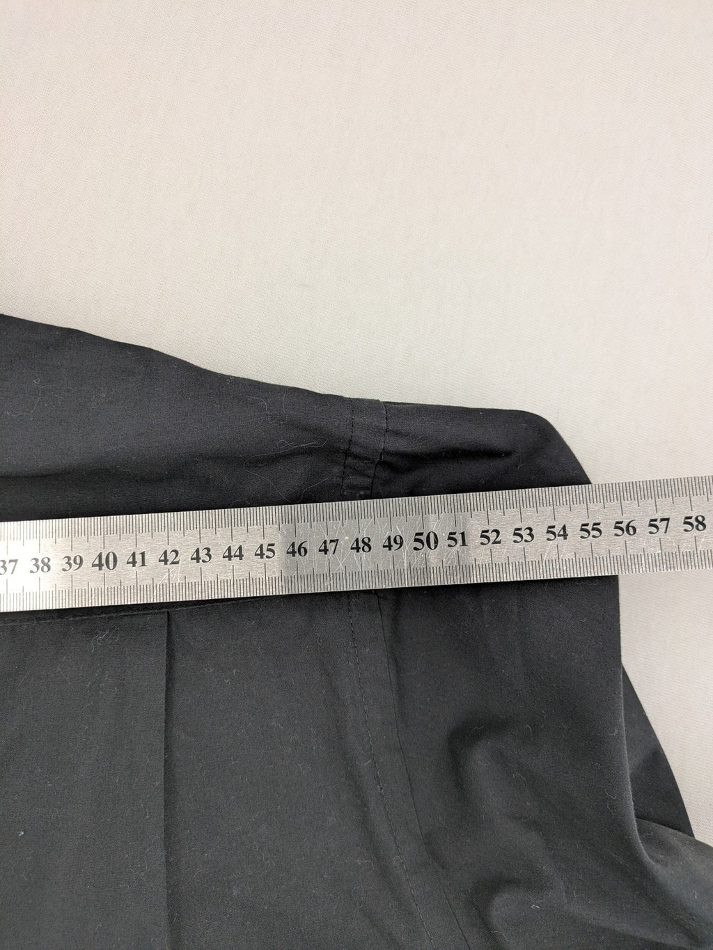 Cedarwood State black long sleeve shirt with classic collar and chest pocket.
