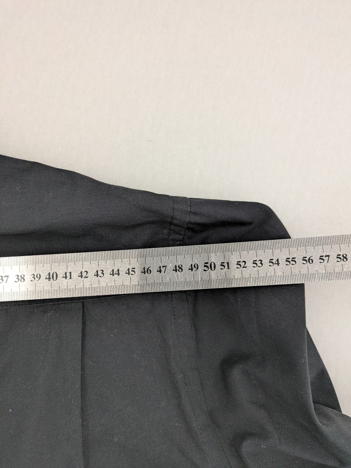 Cedarwood State black long sleeve shirt with classic collar and chest pocket.