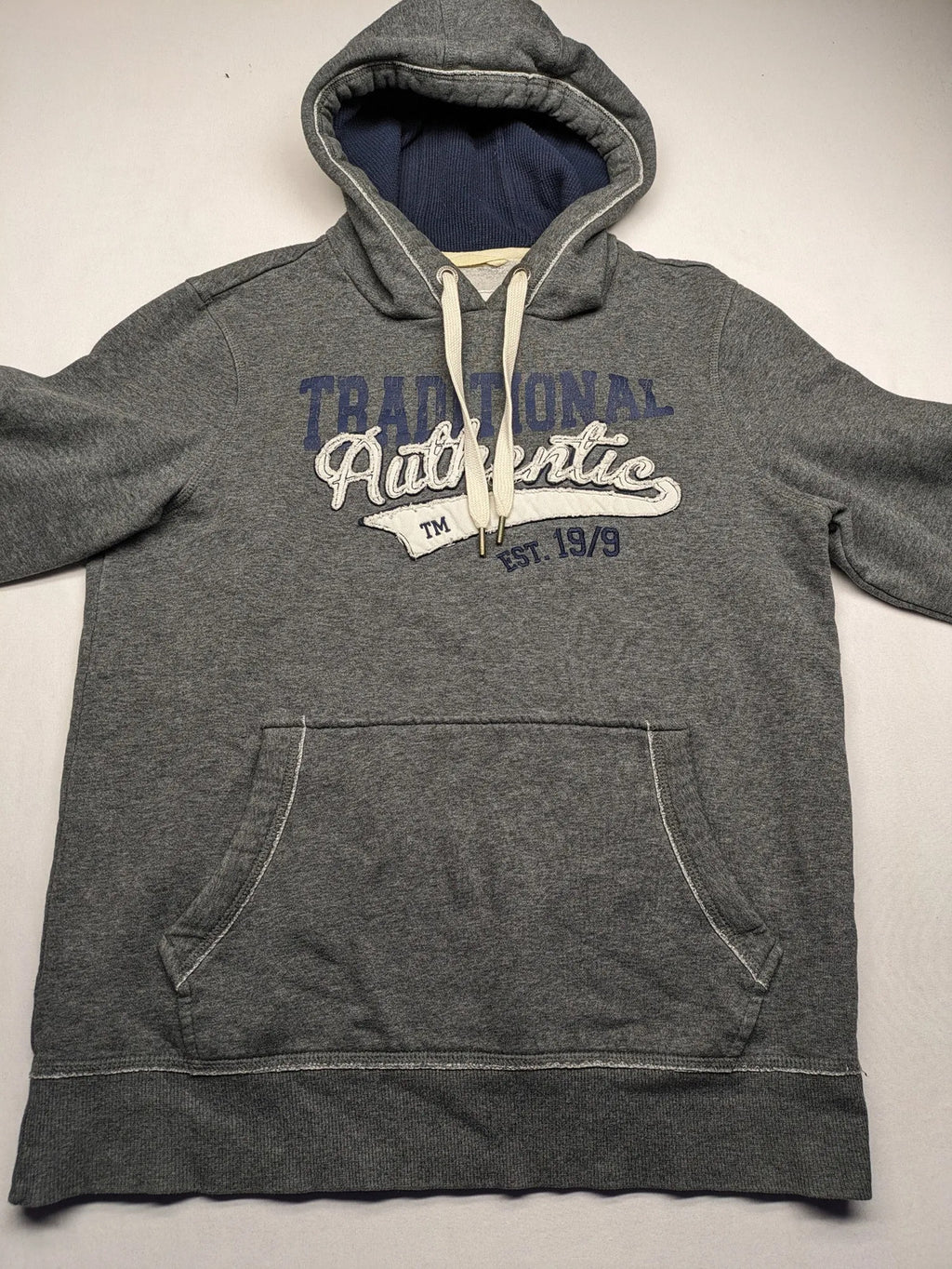 Livergy grey zip-through hoodie with "Traditional Authentic" graphic, kangaroo pocket, soft material.