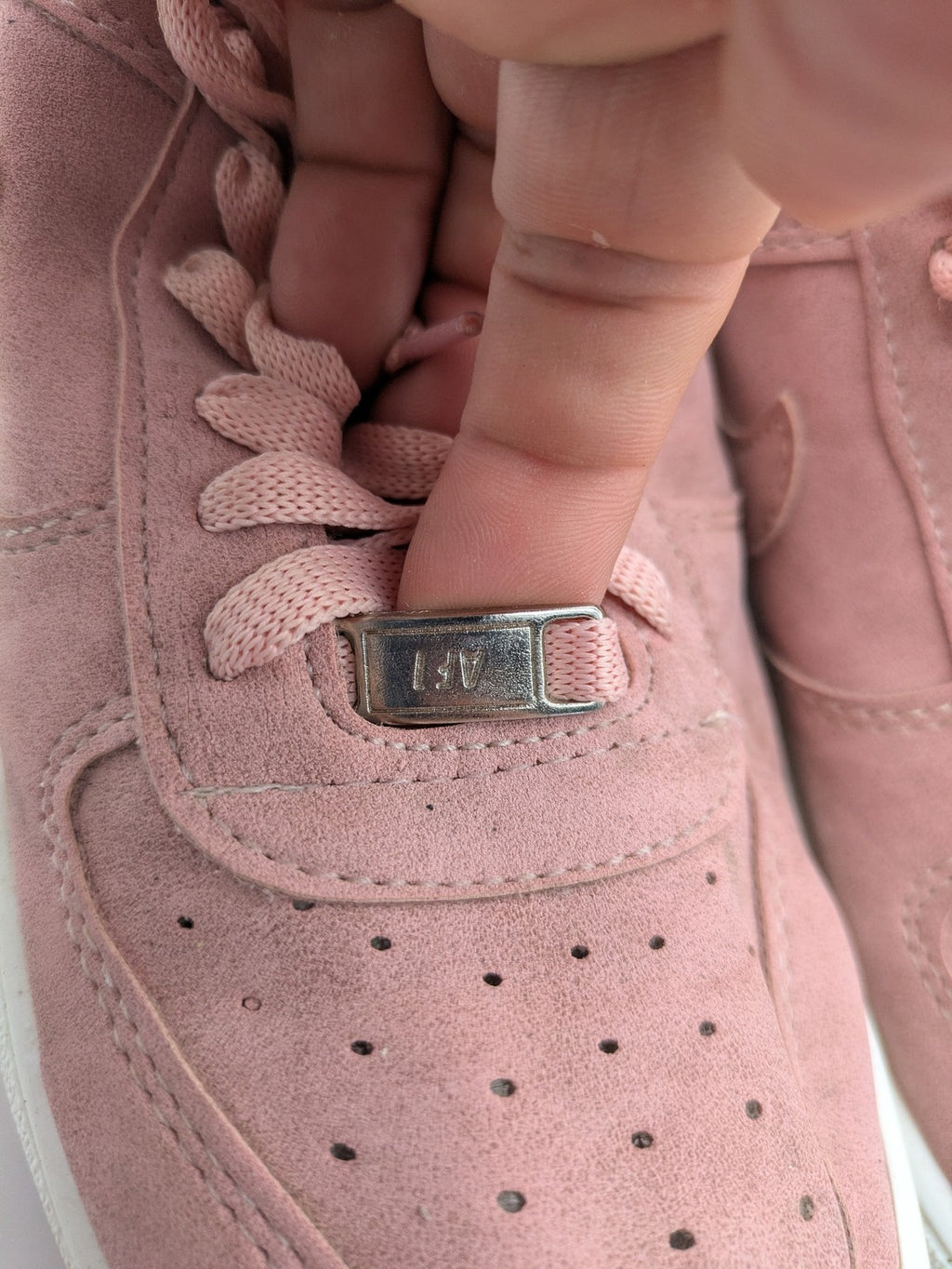 Nike Air Force 1 Low Top pink suede with perforated toe box and white sole