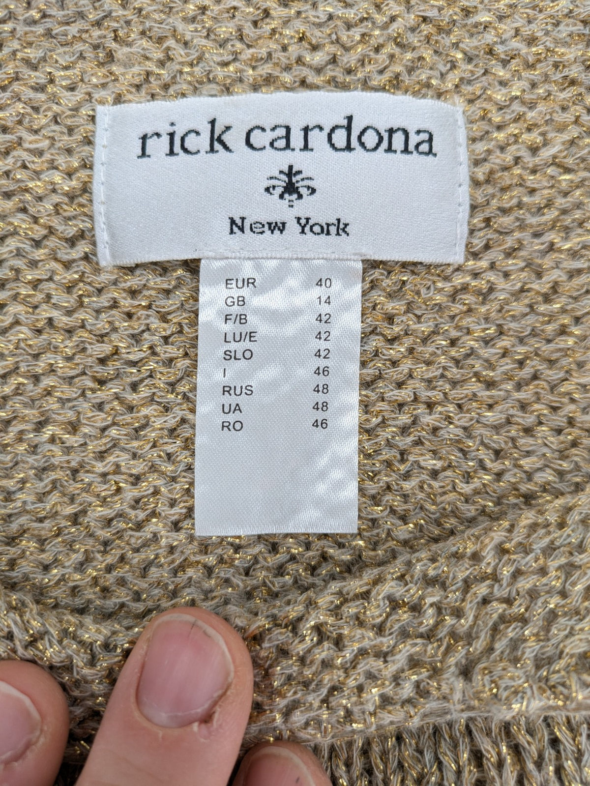 Rick Cardona beige turtle neck jumper with gold metallic thread and balloon sleeves.