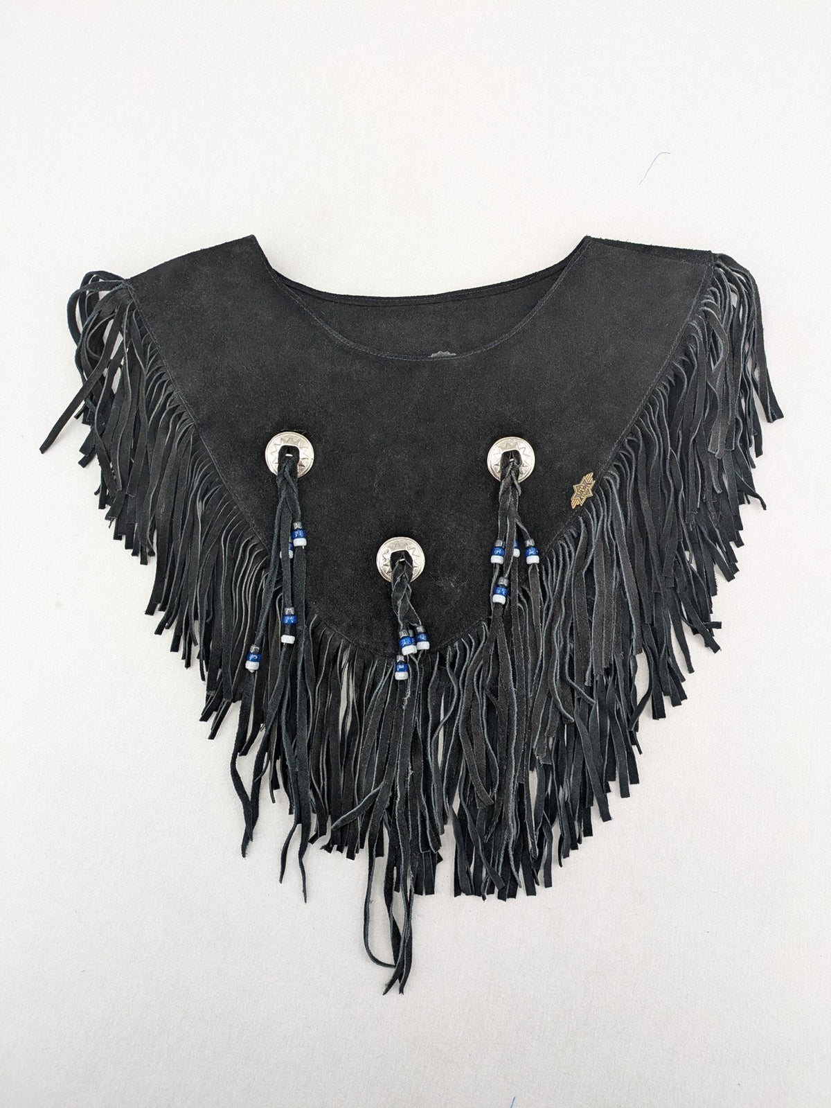 Stars & Stripes black suede fringe vest with silver conchos and beaded tassels.