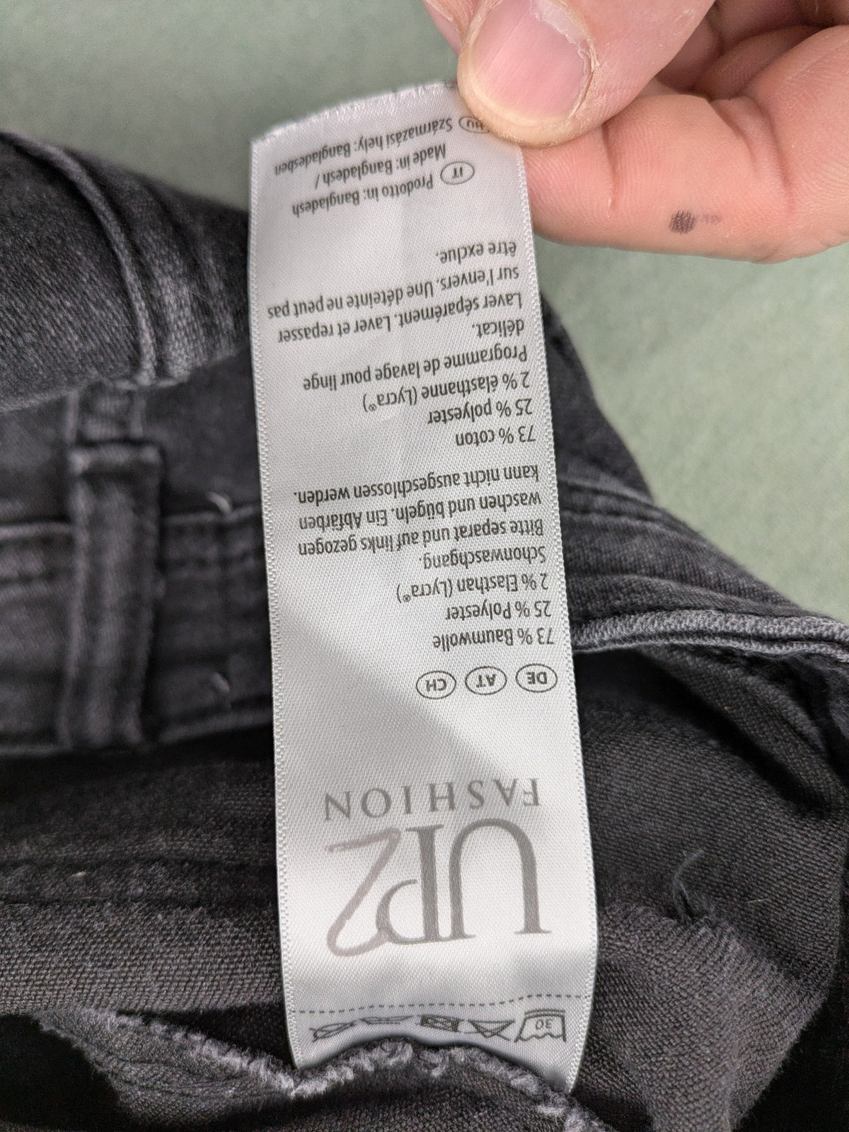 up2 fashion grey skinny jeans with rhinestone embellishments on back pockets