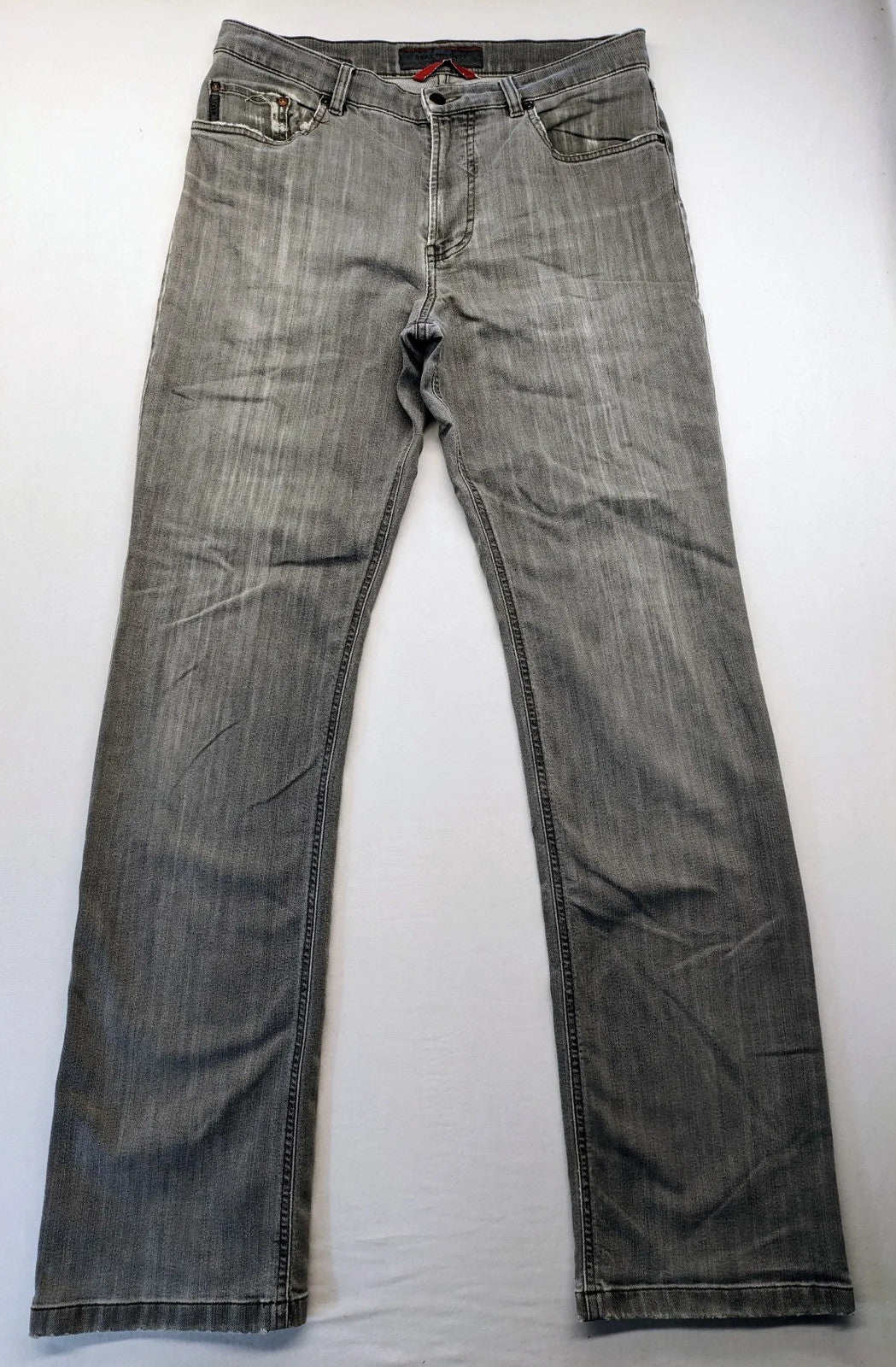 BRAX grey straight jeans with classic 5-pocket style and washed denim finish.