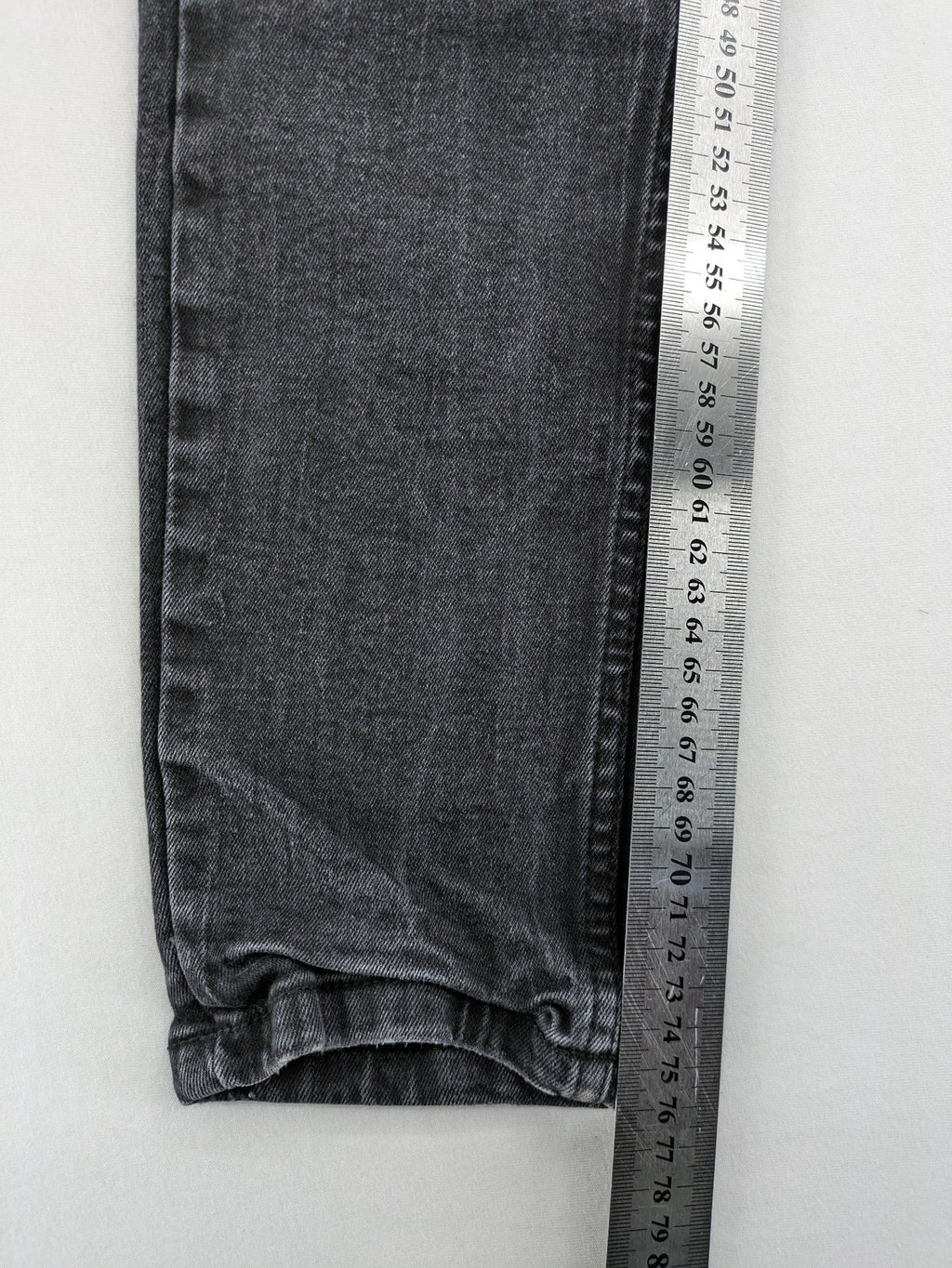 Black Squad skinny fit jeans black distressed ripped design with subtle paint splatter.