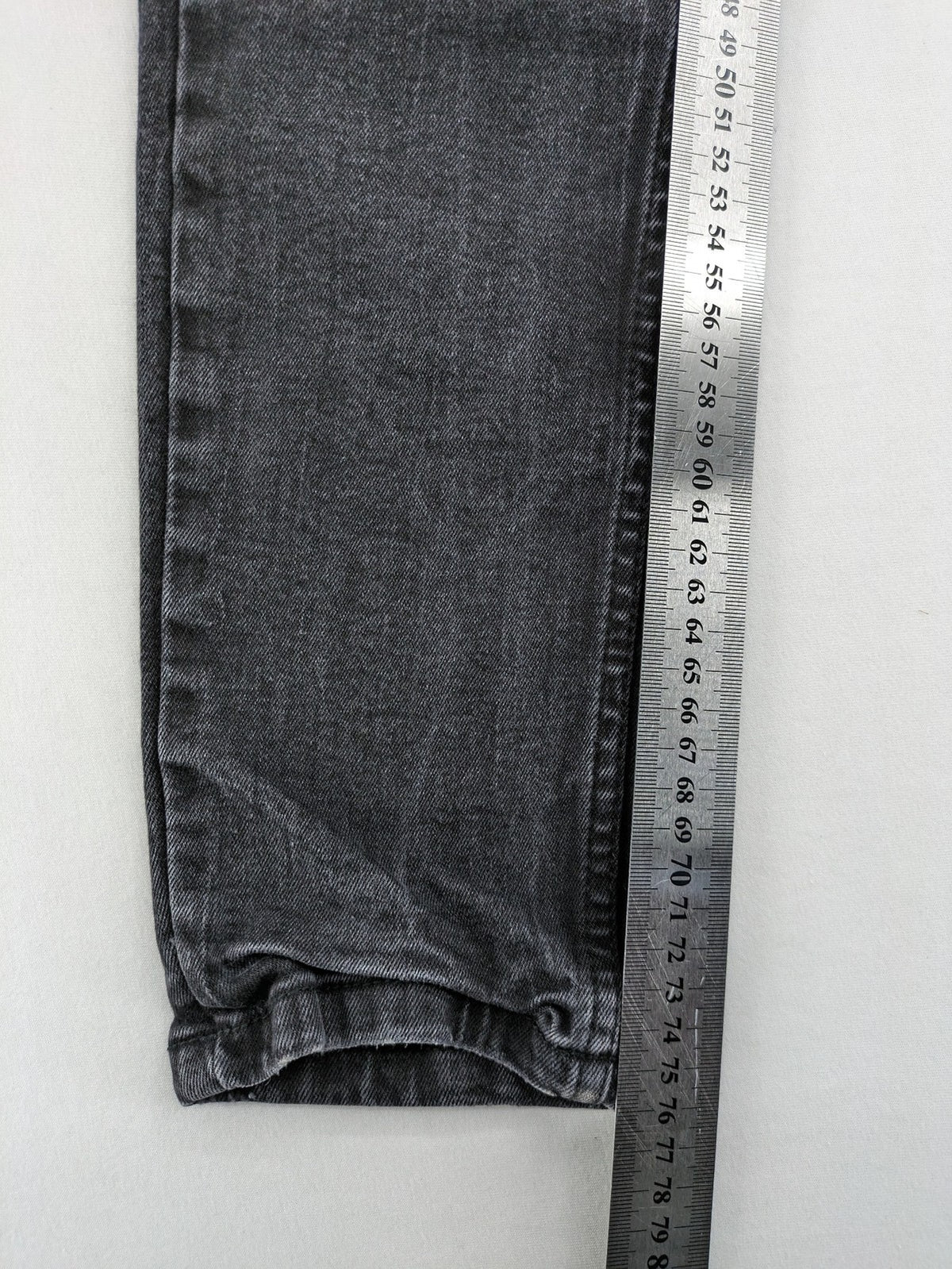 Black Squad skinny fit jeans black distressed ripped design with subtle paint splatter.