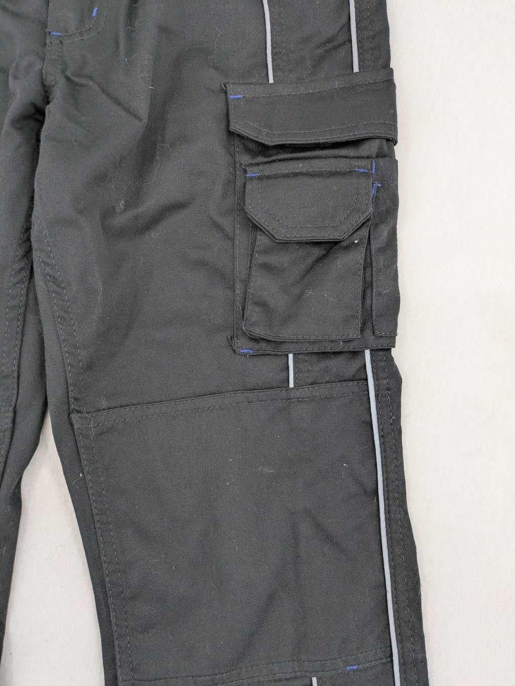 Powerfix Profi blue cargo pants with reflective stripes and side pockets, durable polyester-cotton blend.