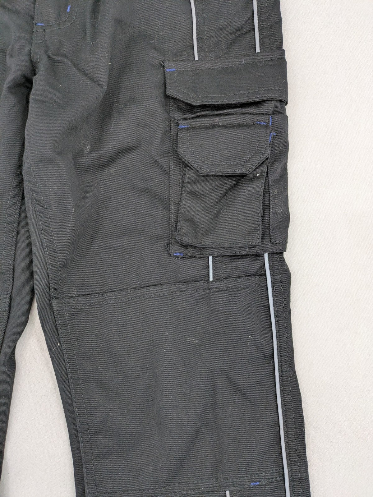 Powerfix Profi blue cargo pants with reflective stripes and side pockets, durable polyester-cotton blend.
