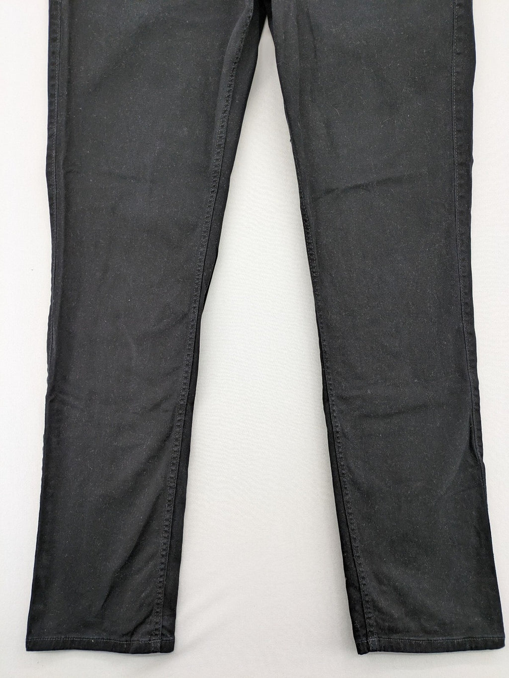 Jack & Jones black slim fit jeans with logo patch and cotton-stretch blend.