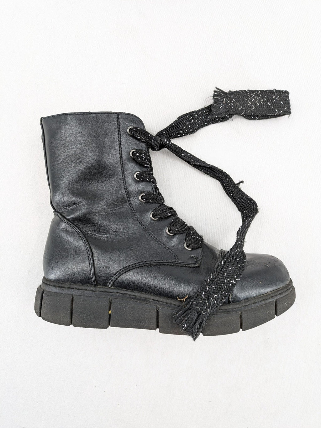 Graceland black combat boots with front lacing and chunky platform sole.