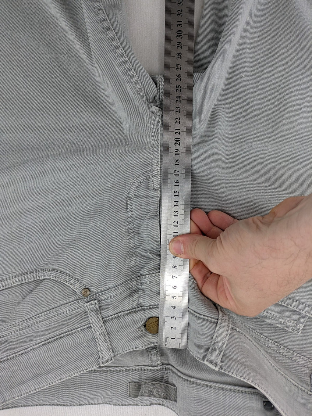 Cambio grey straight leg jeans with five-pocket design and logo button closure.
