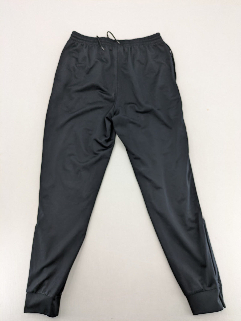 Jako black jogging pants with elastic waistband and ribbed ankle cuffs.